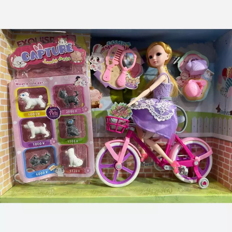 عروسک باربی با دو چرخه